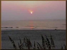 Sunrise over the ocean at Corolla, NC August 8, 2000